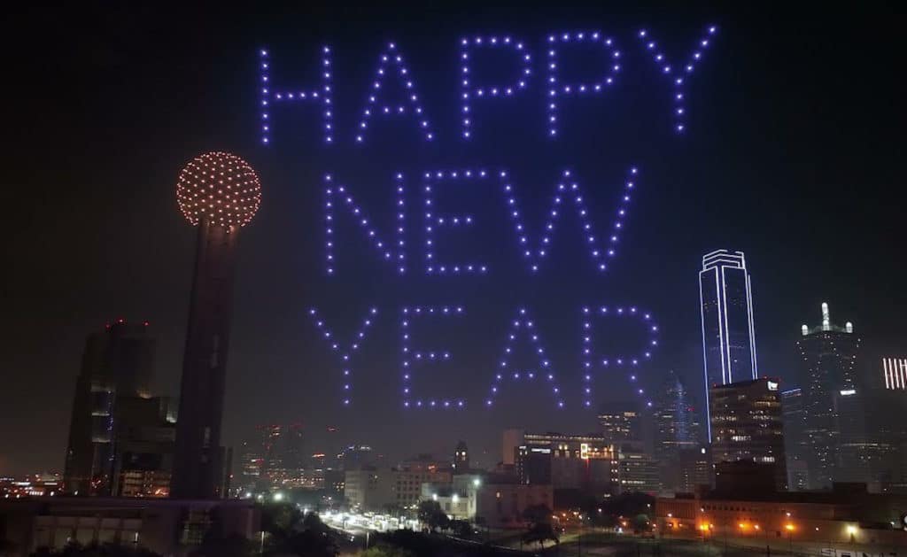 Photo of drones spelling out Happy New Year for Reunion Tower's 2021 New Year's Eve celebrations