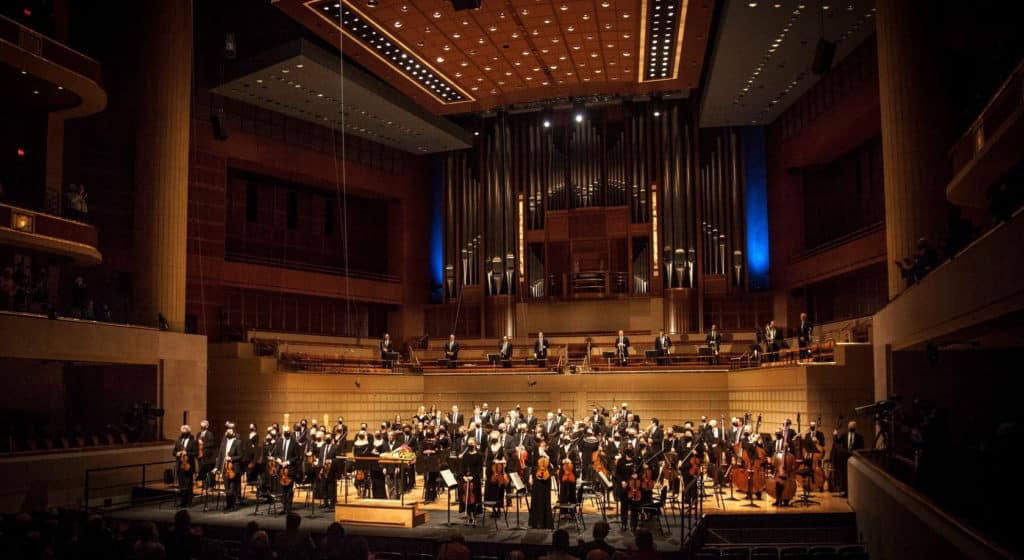 Photo of Dallas Symphony orchestra on stage after performing a concert in Dallas
