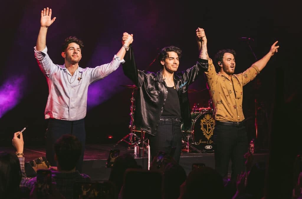 Image showing the Jonas Brothers on stage after performing at a Jonas Brothers show