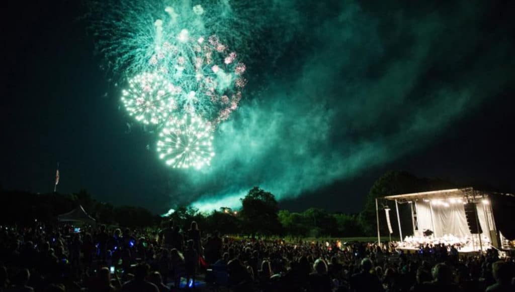 Image showing fireworks above a concerts for Dallas Symphony Orchestra's Symphony in the Parks event series of free outdoor concerts