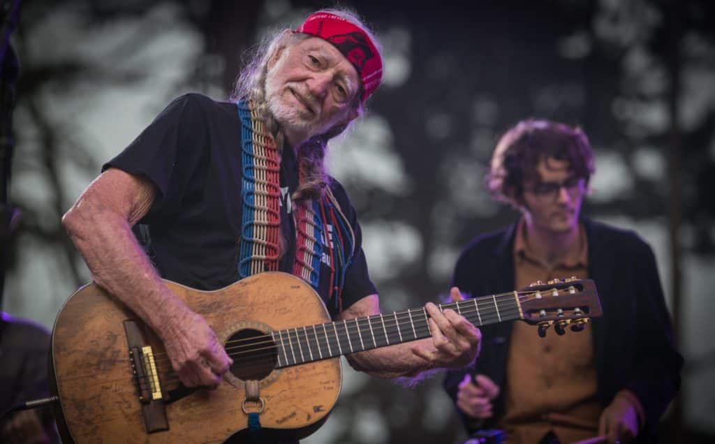 Image of Willie Nelson and son Micah performing at the 2013 Outside Lands music festival
