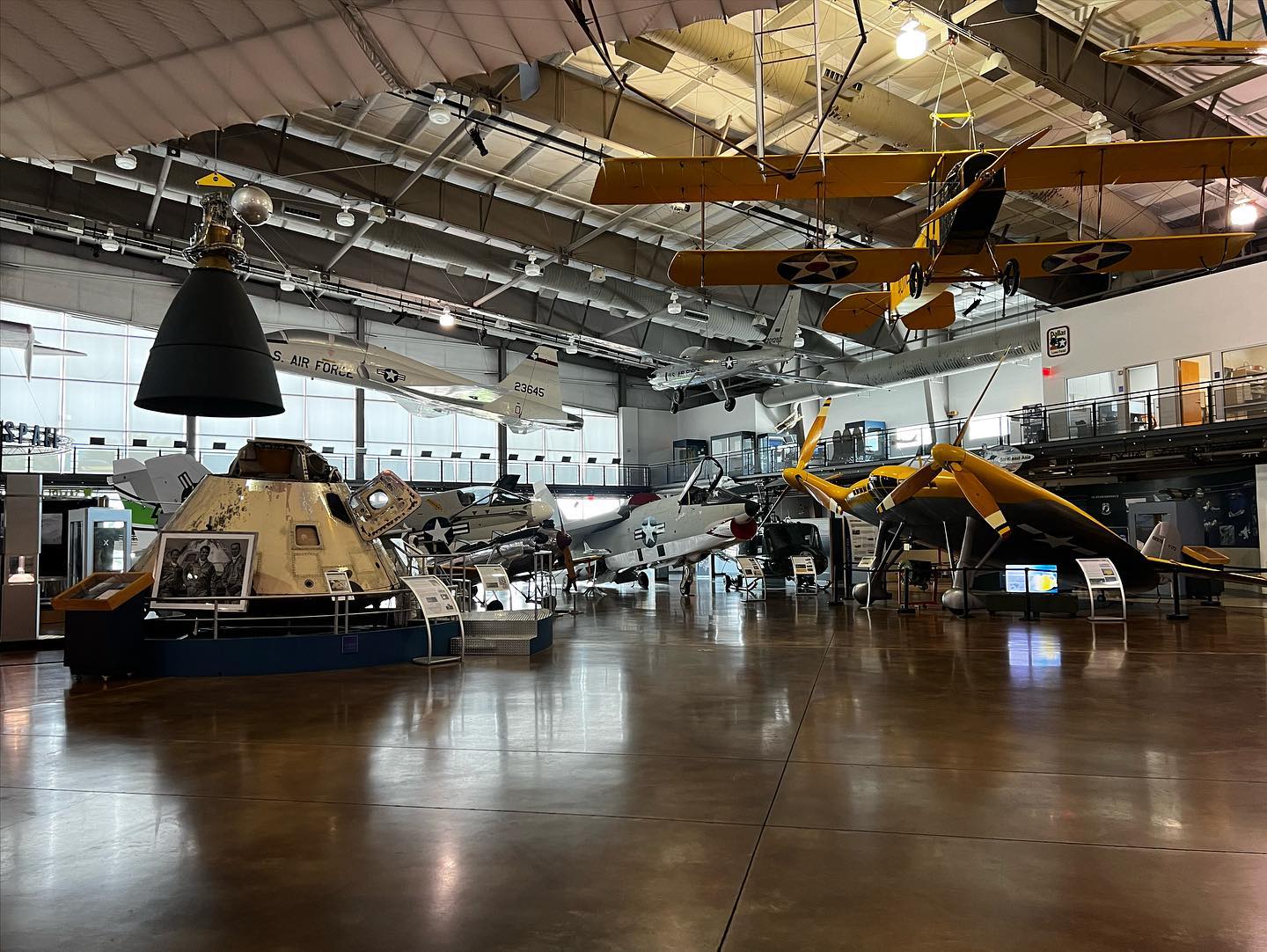 Several exhibits of aircraft and spacecraft at the Frontiers of Flight Museum.